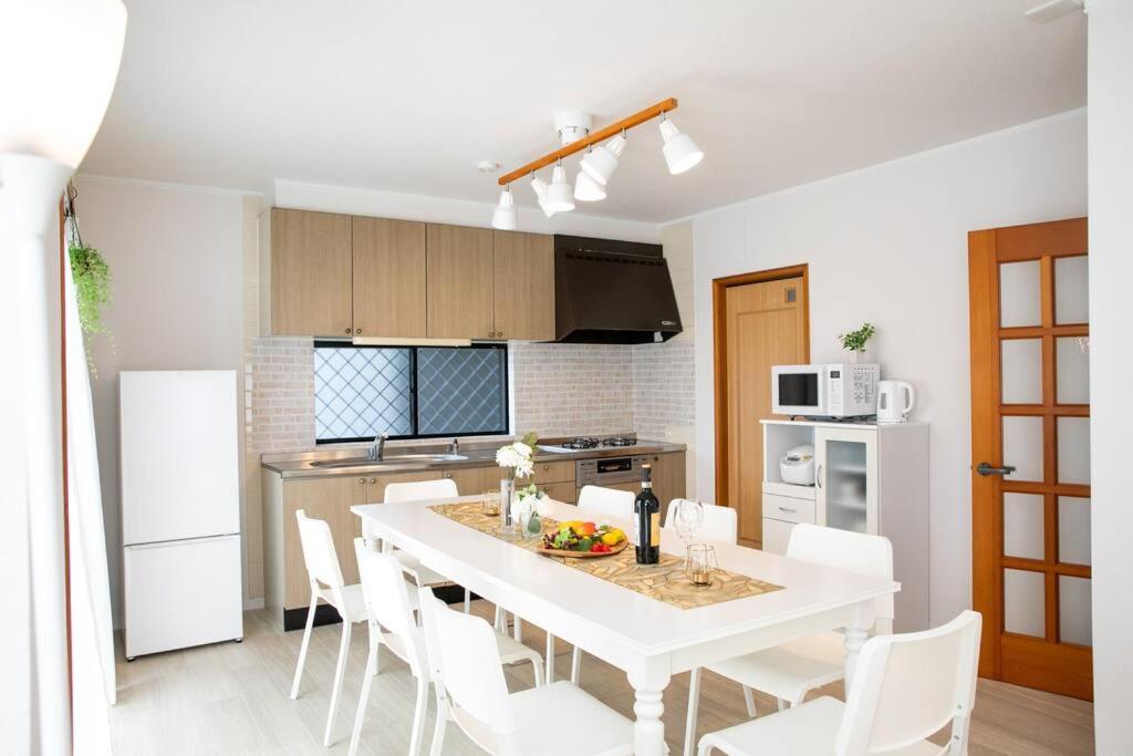 Kuchyň nebo kuchyňský kout v ubytování Nagashima Riverside House 4