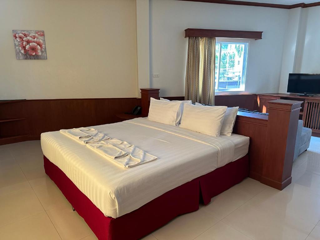 Postel nebo postele na pokoji v ubytování Sabai Sabai hotel