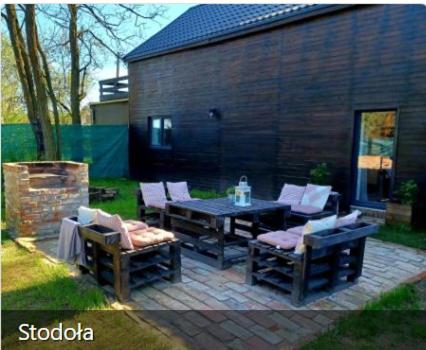 Vonkajšia záhrada v ubytovaní Stodoła HOME&CHILL