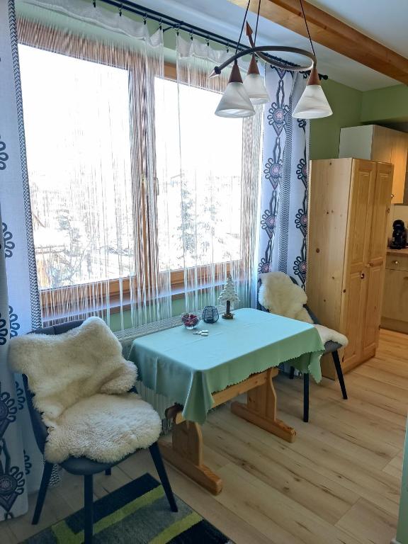 Posezení v ubytování Apartamenty u drwala