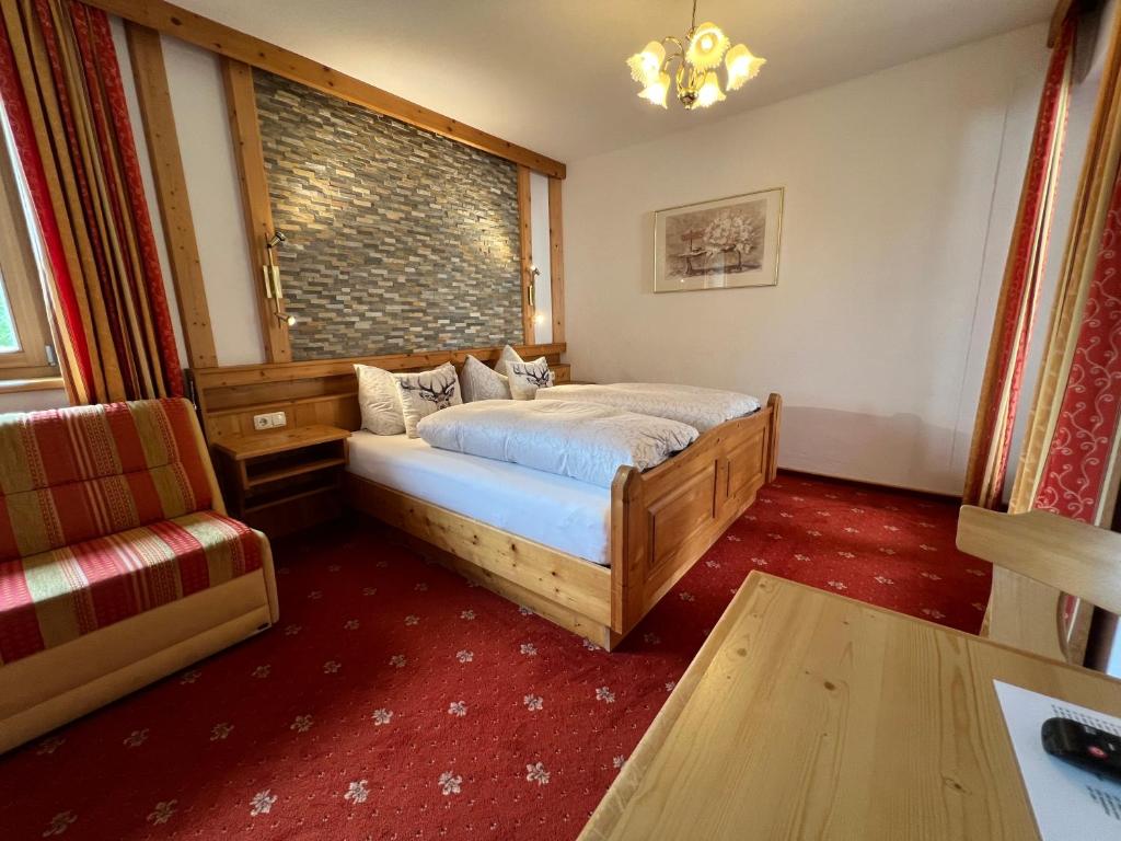 Posteľ alebo postele v izbe v ubytovaní Hotel Garni Gafluna