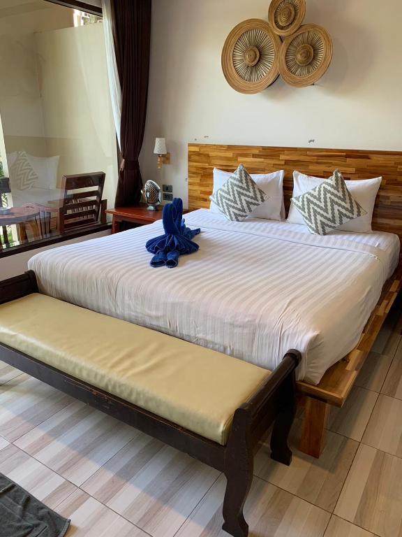 Postel nebo postele na pokoji v ubytování Wind Beach Resort