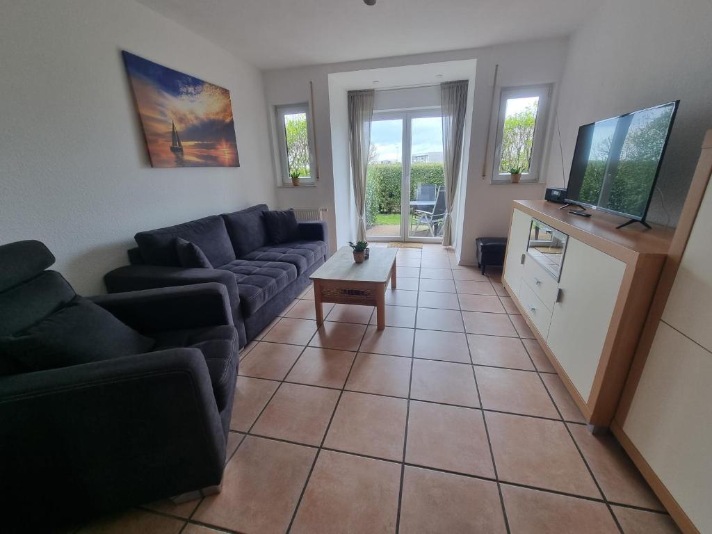 TV a/nebo společenská místnost v ubytování Nordseehaus Dangast