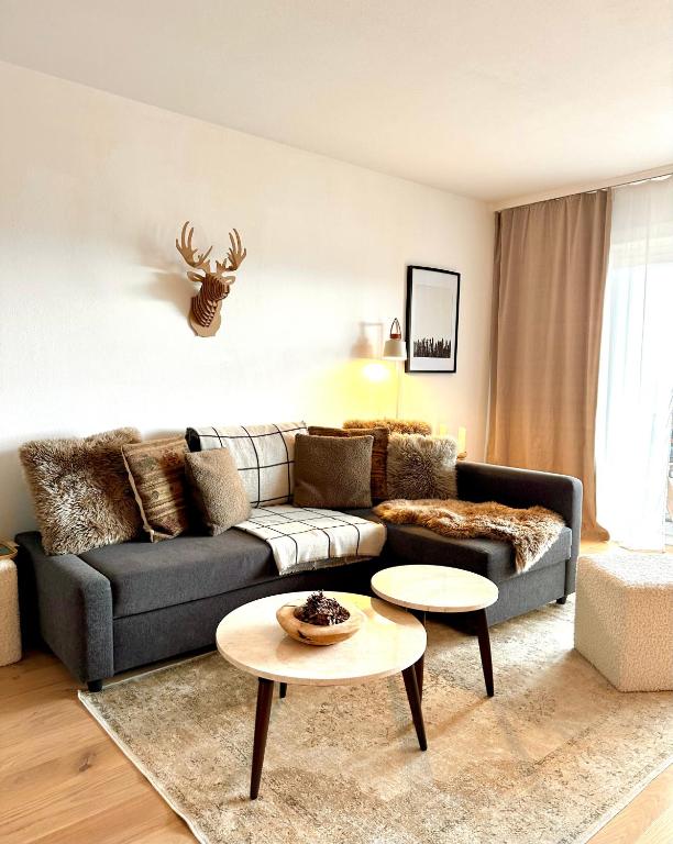 Posezení v ubytování Window on Crans Montana, Appartement avec vue sur les Alpes