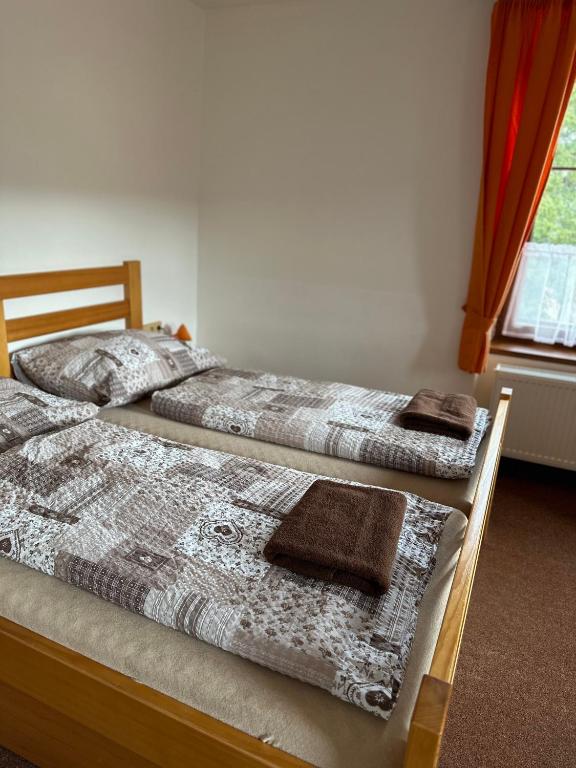 Postel nebo postele na pokoji v ubytování Chata Polka