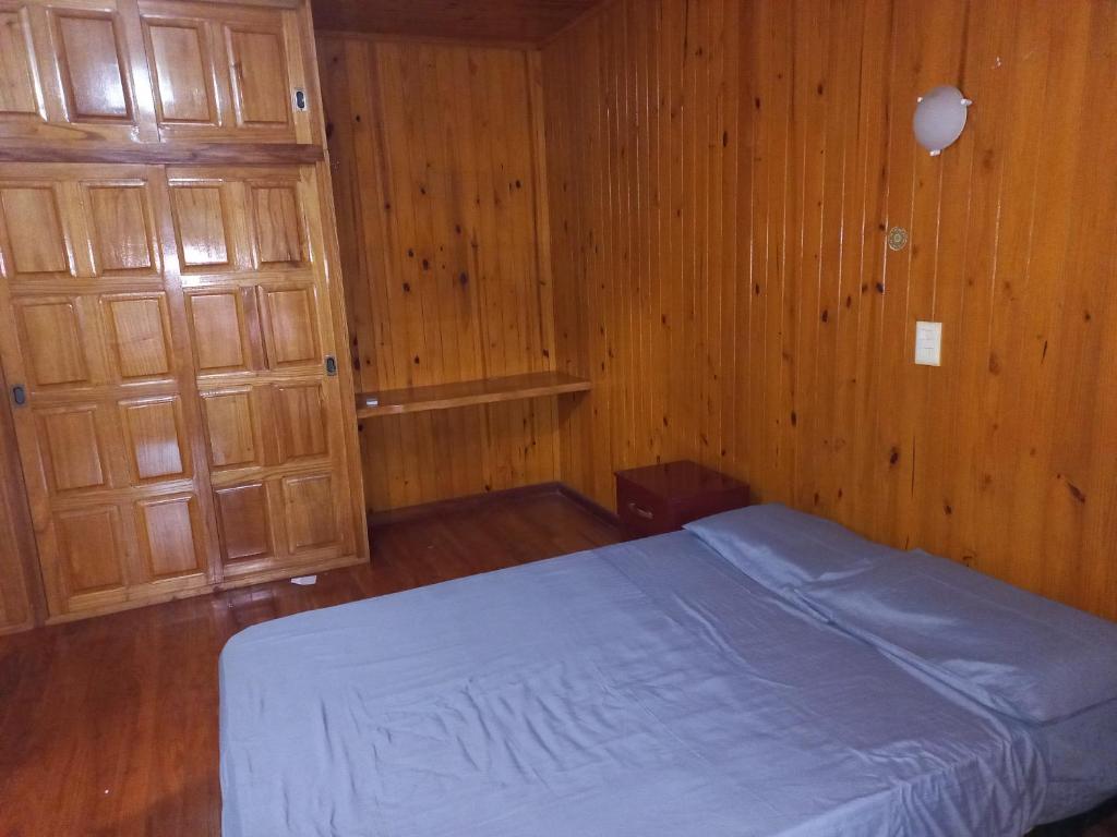 Postel nebo postele na pokoji v ubytování Cabañas Raíces Pampeanas