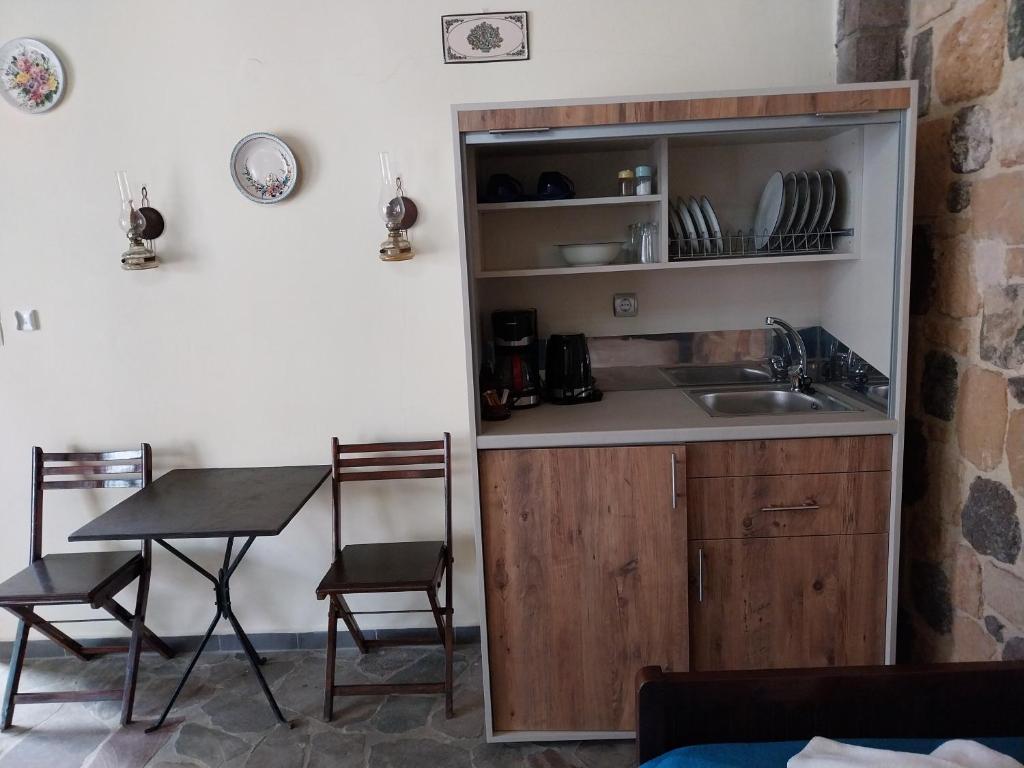 Kuchyň nebo kuchyňský kout v ubytování Ela Mesa