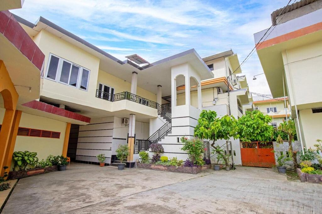 an image of a house at Malibou Hotel in Tebingtinggi