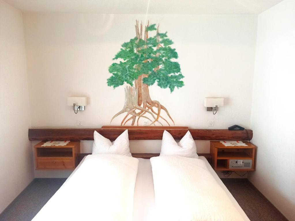 Postel nebo postele na pokoji v ubytování Hotel Acla Filli