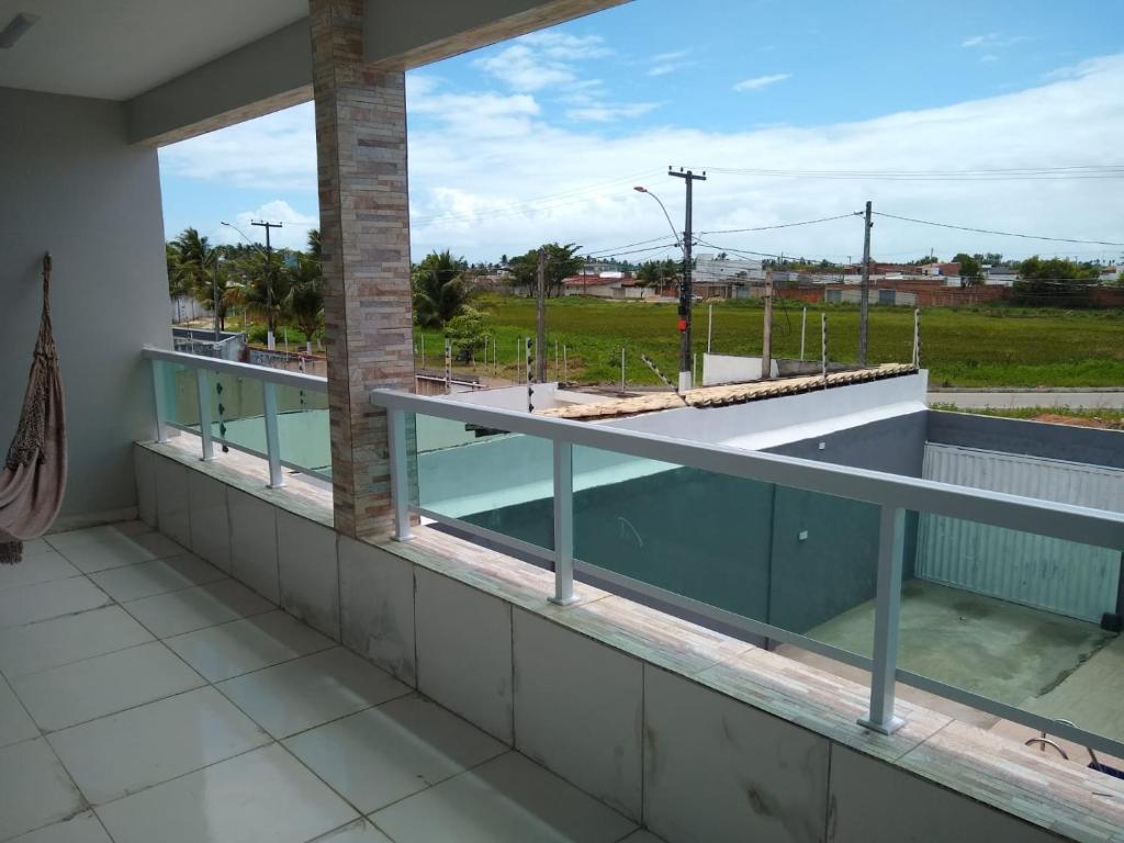 a view from the balcony of a building at Casa Buzios do Francês in Marechal Deodoro