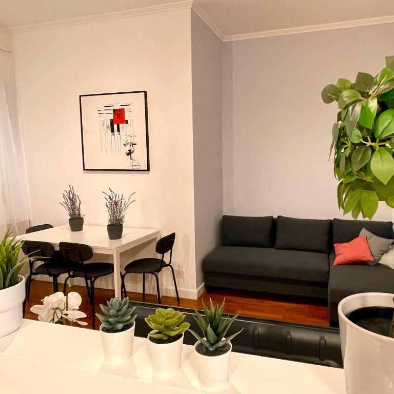 Area soggiorno di Lazy Time Apartment