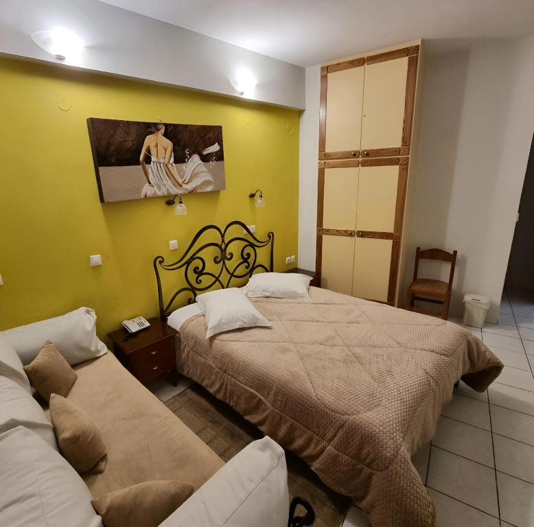 Posteľ alebo postele v izbe v ubytovaní Pitho