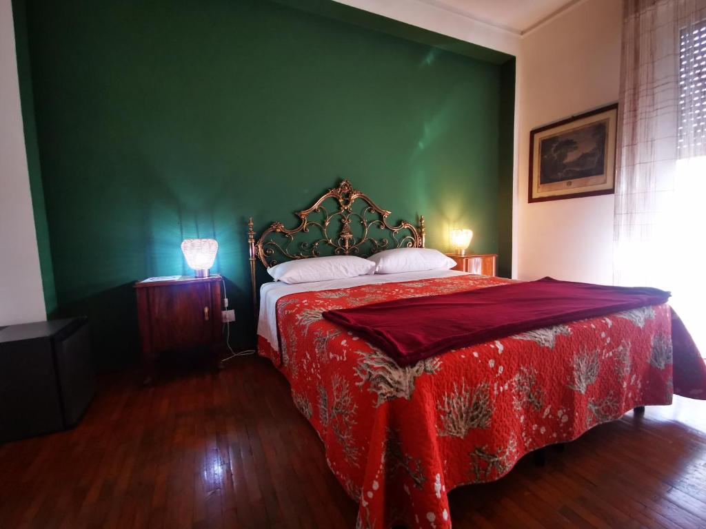 Postel nebo postele na pokoji v ubytování Affittacamere Room ospedale Maggiore