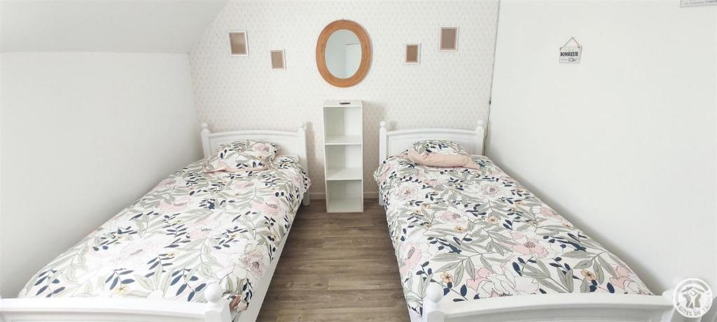 Posteľ alebo postele v izbe v ubytovaní Chez Juline - Gîte Nature et Bien-être