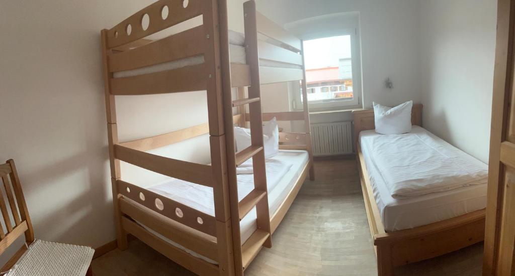 Postel nebo postele na pokoji v ubytování Hotel Löwen