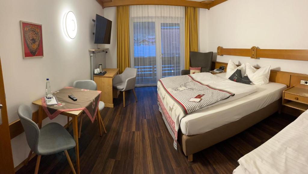 Postel nebo postele na pokoji v ubytování Hotel Löwen