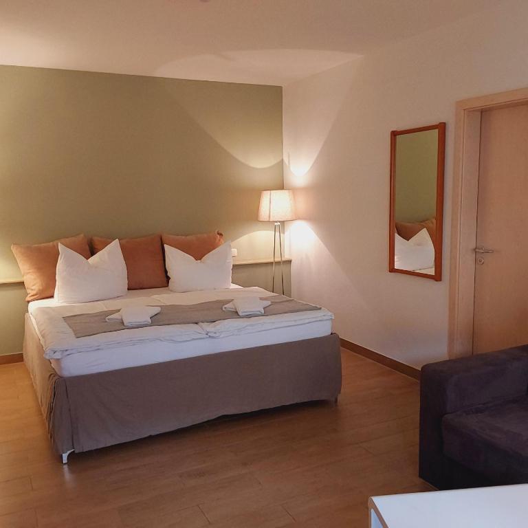 Postel nebo postele na pokoji v ubytování Bed and Breakfast Wehlen