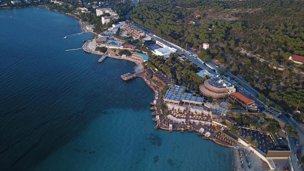 an aerial view of a resort next to the water at Maja Luxury Resort Hotel in Cesme