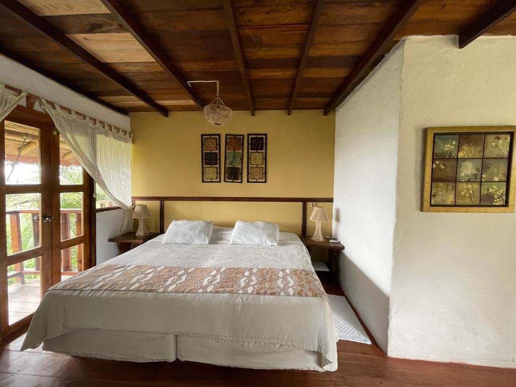 Postel nebo postele na pokoji v ubytování Samai Lodge Holistic Living