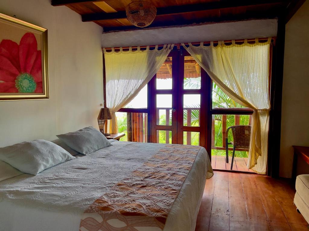 Postel nebo postele na pokoji v ubytování Samai Lodge Holistic Living