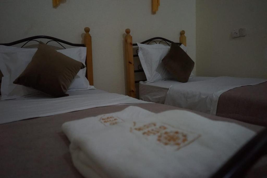 Llit o llits en una habitació de Riad Assia Foum Zguid
