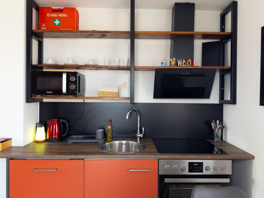 Kuchyň nebo kuchyňský kout v ubytování Golubina 1 - Studio Apartman