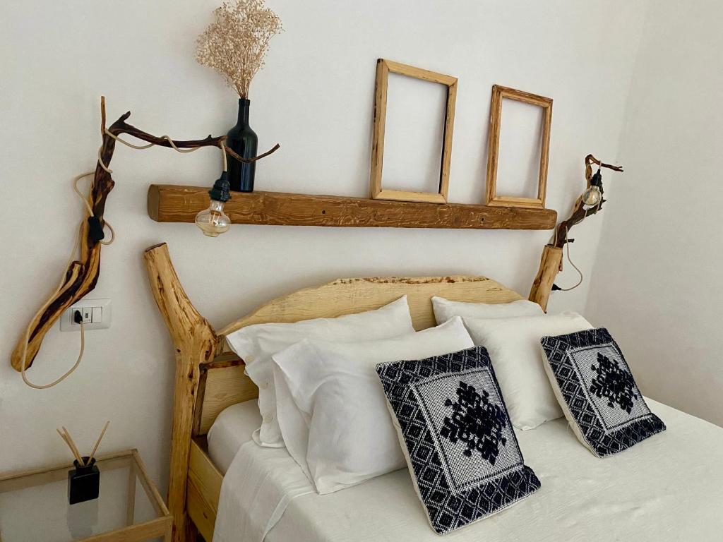 Postel nebo postele na pokoji v ubytování I Ginepri