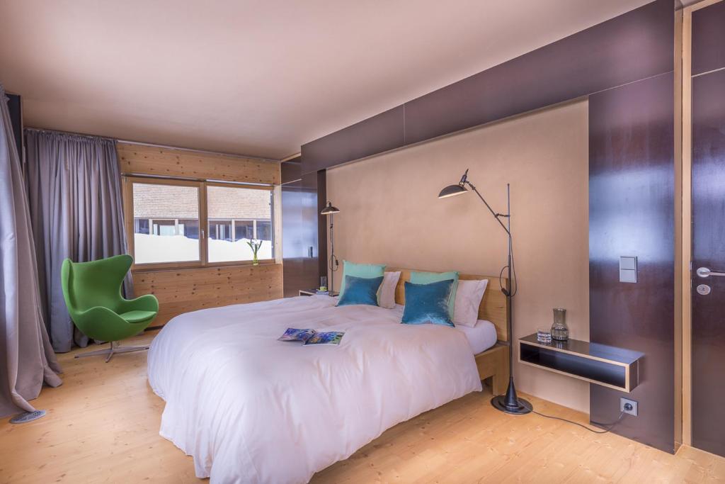 Postel nebo postele na pokoji v ubytování Design Chalets Lech