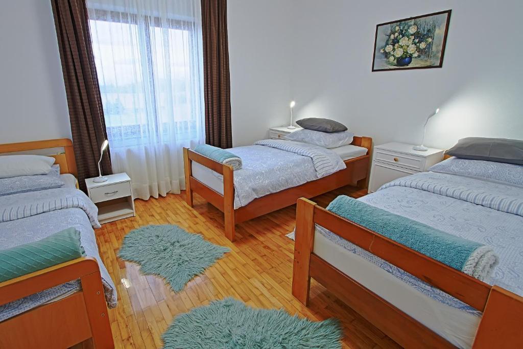 Posteľ alebo postele v izbe v ubytovaní Holiday Home Sinac