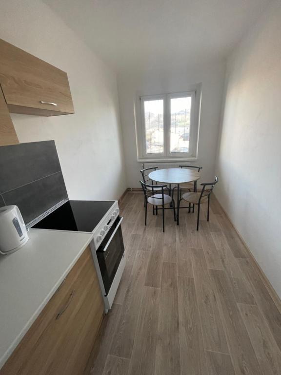 Kuchyň nebo kuchyňský kout v ubytování Apartmány Ferie