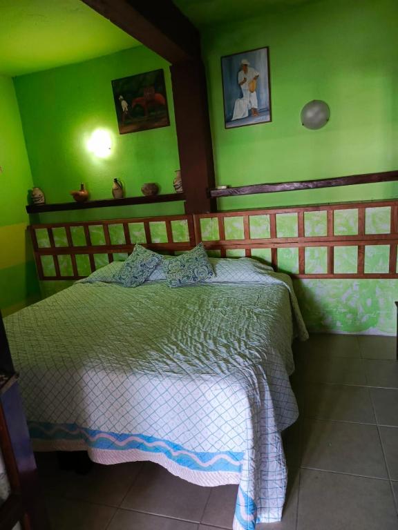 Postel nebo postele na pokoji v ubytování Posada Familiar Papantla