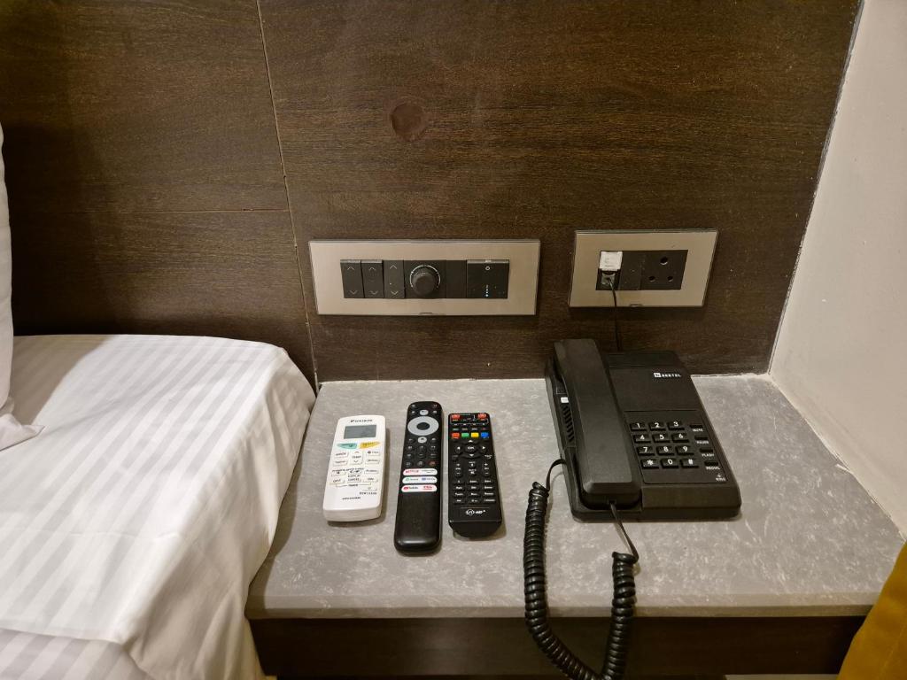 Postel nebo postele na pokoji v ubytování Hotel JANAS