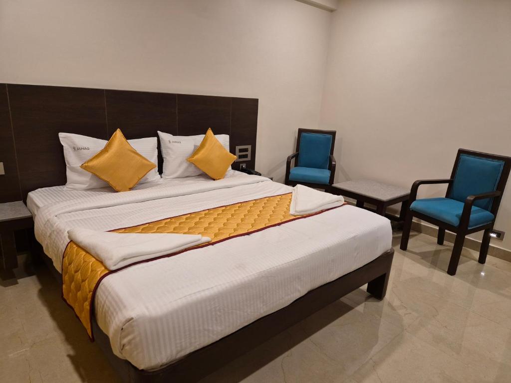Postel nebo postele na pokoji v ubytování Hotel JANAS