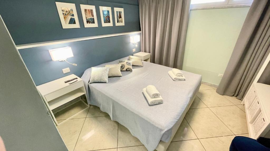 A bed or beds in a room at A casa di Emma (camera Levante)