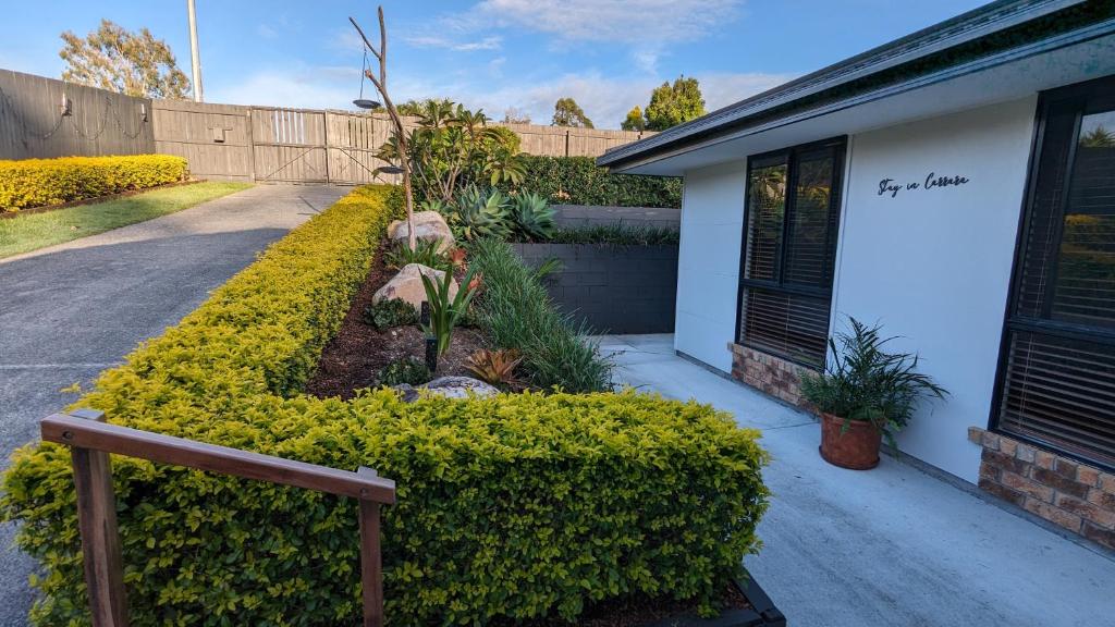 a garden in front of a house at 'Stay in Carrara' A private guest suite not a share house in Gold Coast