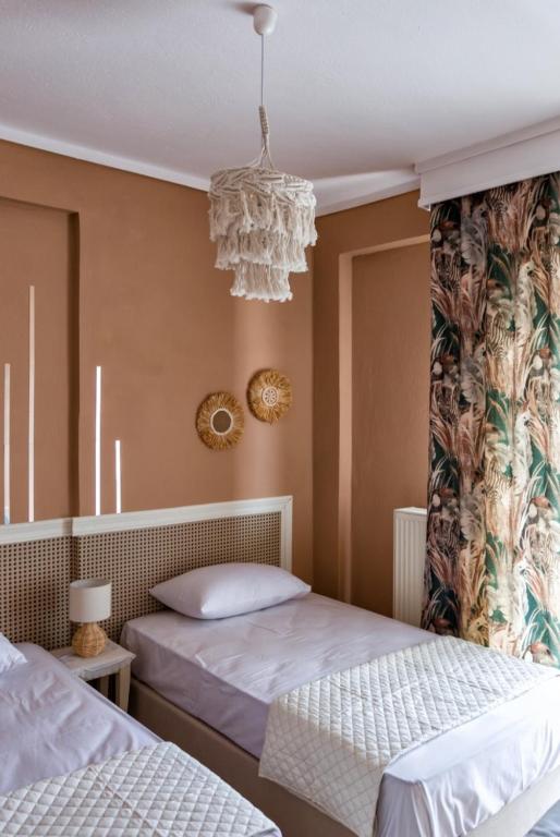 Postel nebo postele na pokoji v ubytování Kalendes home