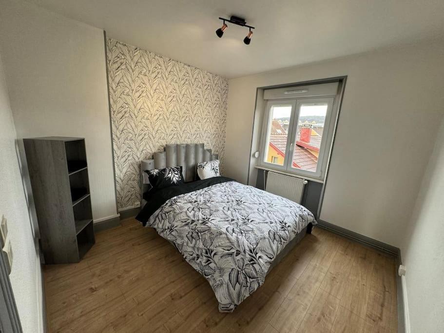 Tempat tidur dalam kamar di T3 Premium - Calme &amp; spacieux 6-12 personnes