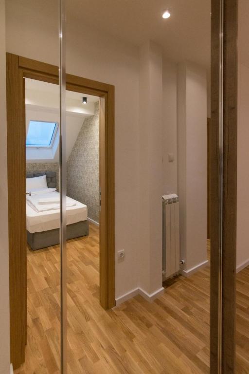 Postel nebo postele na pokoji v ubytování Tara Lux apartmani