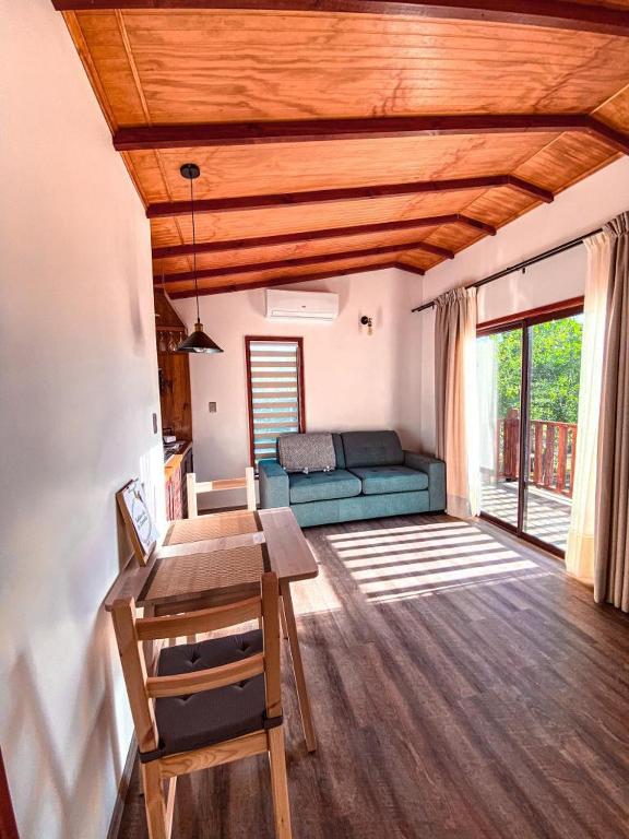 Posezení v ubytování Cabañas Boutique Faldeos de La Lajuela