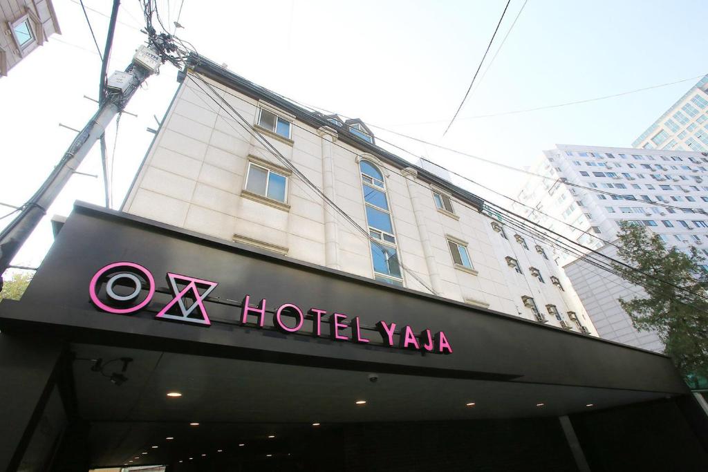 a hotel sign on the front of a building at Hotel Yaja Jongno in Seoul