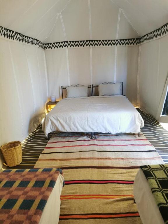 Llit o llits en una habitació de Riad Assia Foum Zguid