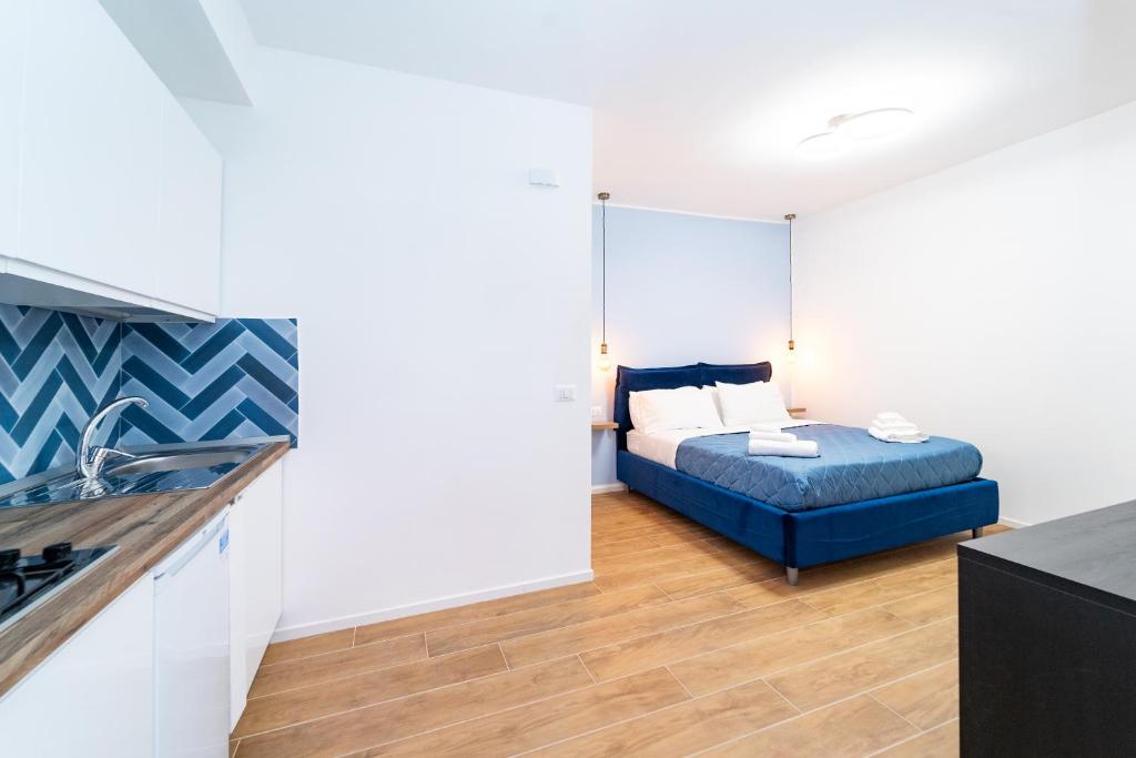 Llit o llits en una habitació de Procida - Roots Partenopee