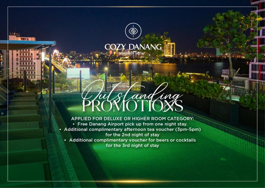 a flyer for a hotel and my photographs at night at Cozy Danang Boutique Hotel in Danang