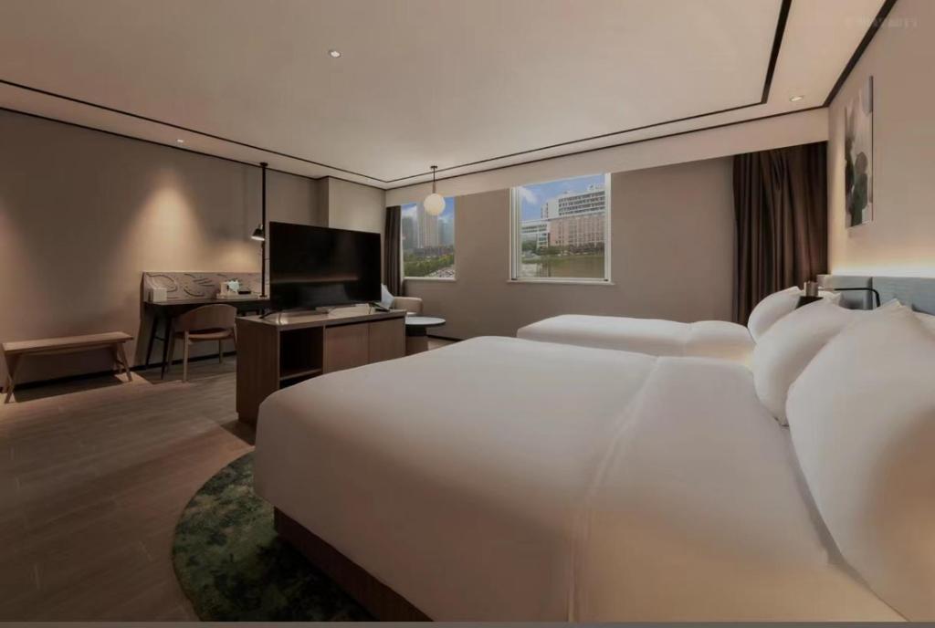 Hilton Garden Inn Nantong Xinghu - ファミリールーム