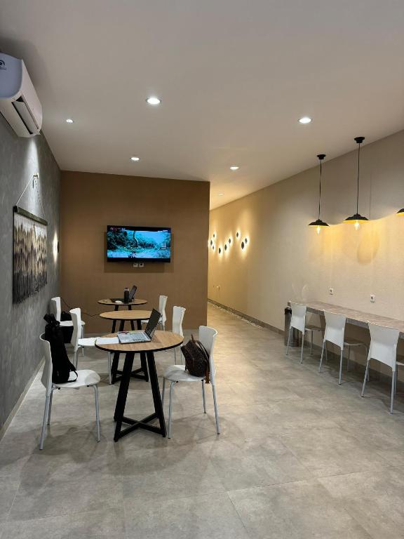 TV a/nebo společenská místnost v ubytování Youkata stay Hotel
