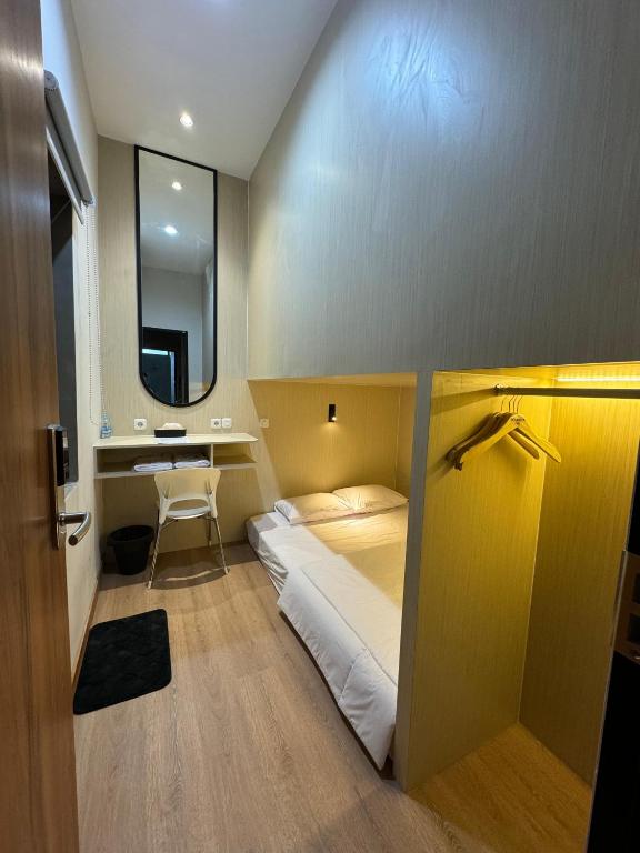 Postel nebo postele na pokoji v ubytování Youkata stay Hotel