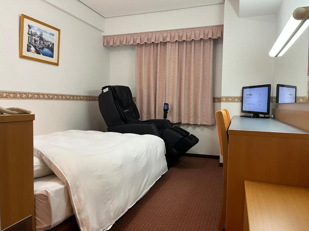 TV a/nebo společenská místnost v ubytování Hotel Alpha-One Niigata