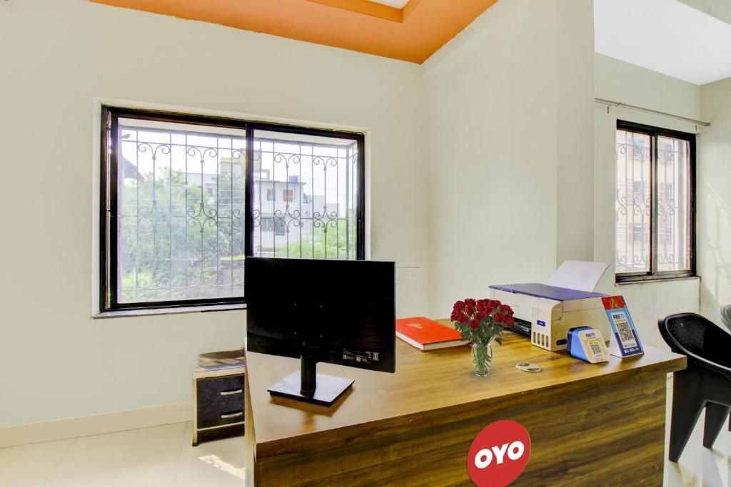 TV a/nebo společenská místnost v ubytování Hotel O Ap Royal Rooms