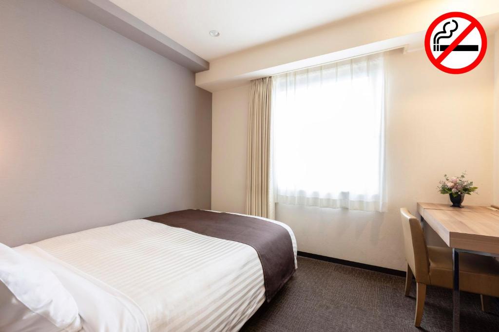 Postel nebo postele na pokoji v ubytování Choshi Plaza Hotel