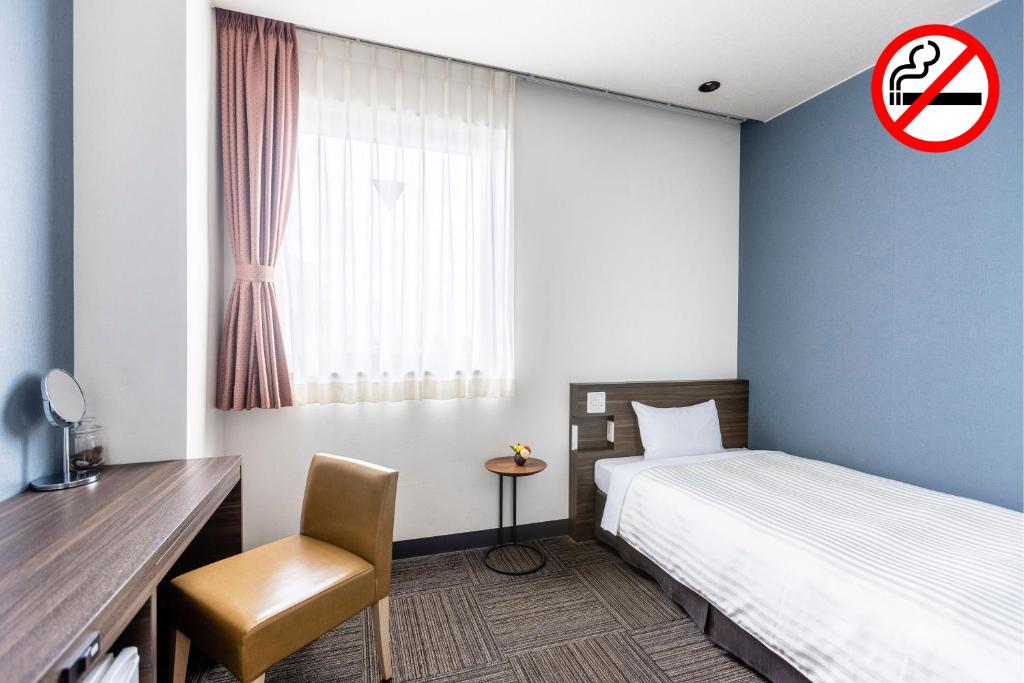 Postel nebo postele na pokoji v ubytování Choshi Plaza Hotel